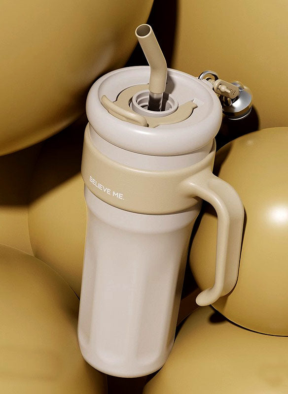 MyLaEvo beige bottle with red accessories in yellow spherical setting