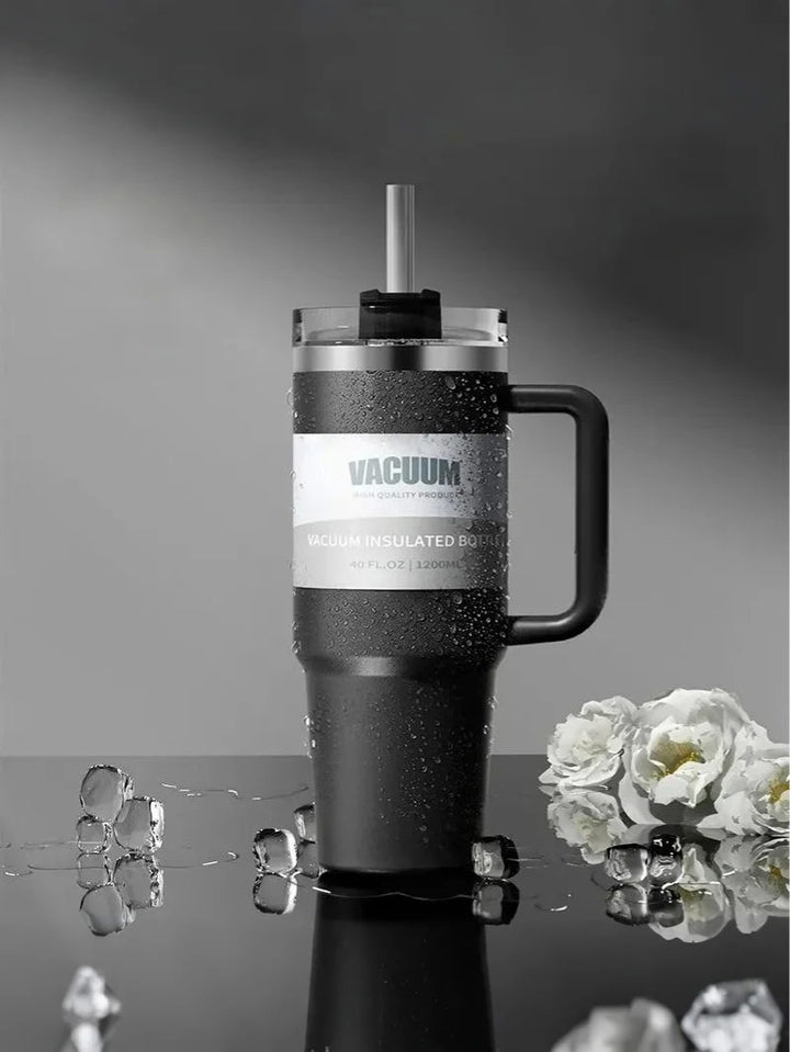 MyLaEvo black bottle with cold droplets and white flowers in dark minimalist space