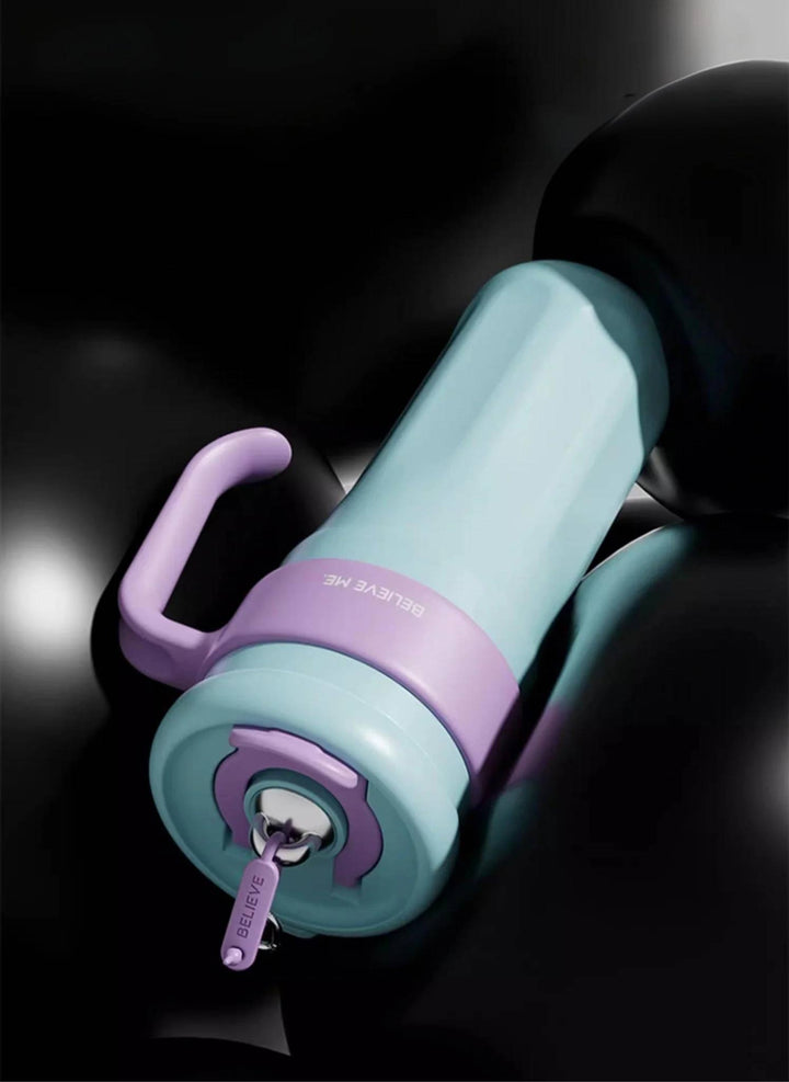 MyLaEvo light blue bottle with purple handle on black backdrop, matte texture focus