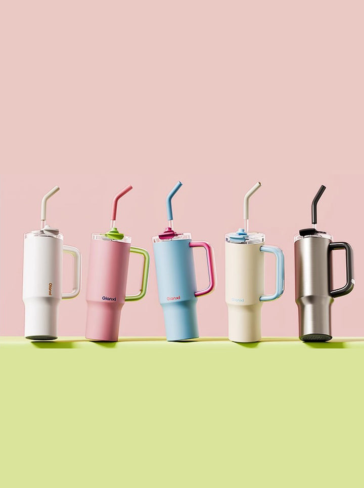White, pink, blue, yellow, and silver bottles on color-block background – MyLaEvo.