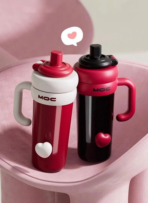 MyLaEvo red-white and black-red bottles displayed together with heart icons in pink space