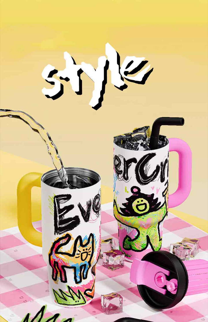 One tumbler pouring water, another full of ice cubes on pink-white checkered cloth