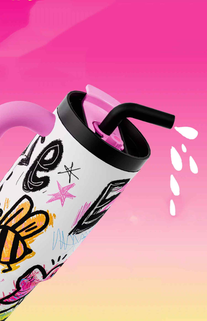 Pink tumbler tilted with water droplets near straw, yellow-pink background, leakproof design