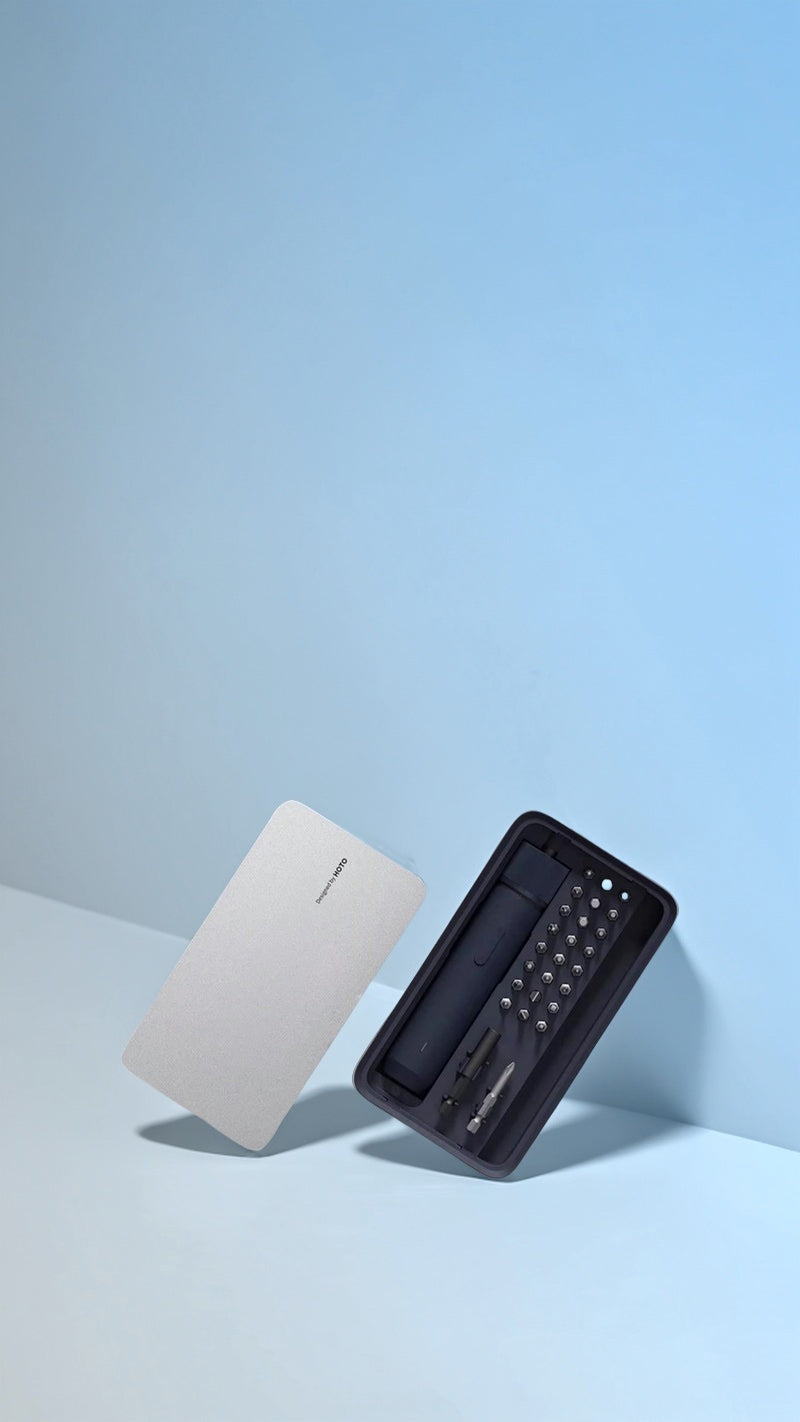 Electric screwdriver neatly placed in its case within a stylish, modern-toned space, highlighting the product’s lightweight and portable design.