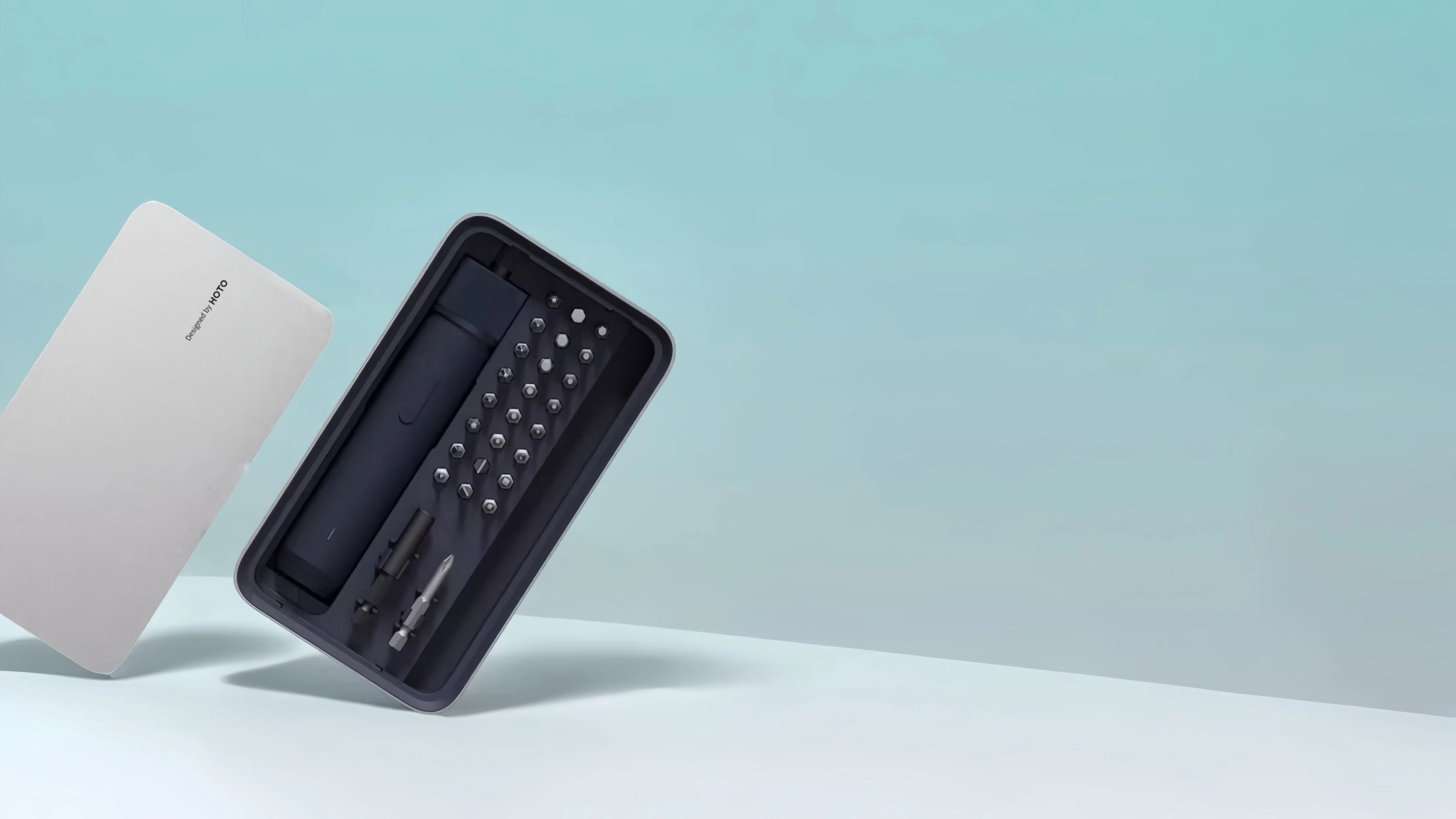 Electric screwdriver standing in a minimalist space, highlighting its sleek design and modern aesthetic appeal.