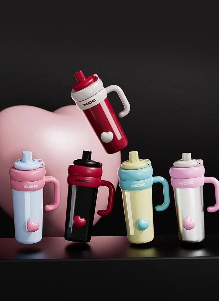 MyLaEvo weekday mood bottles in five colors with pink hearts on dark backdrop