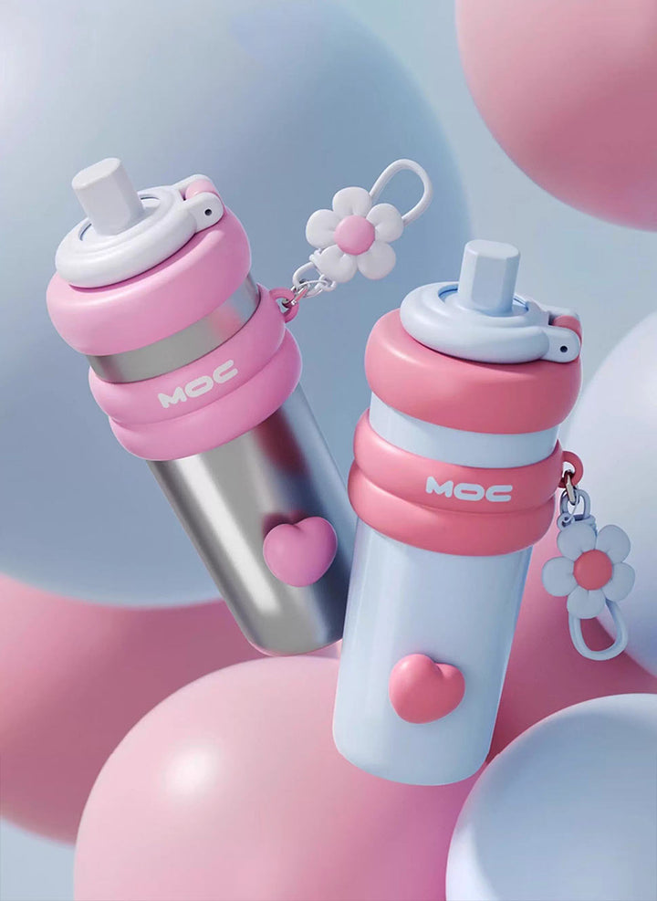 MyLaEvo pastel blue, pink, and silver bottles floating in soft blue and pink spherical background