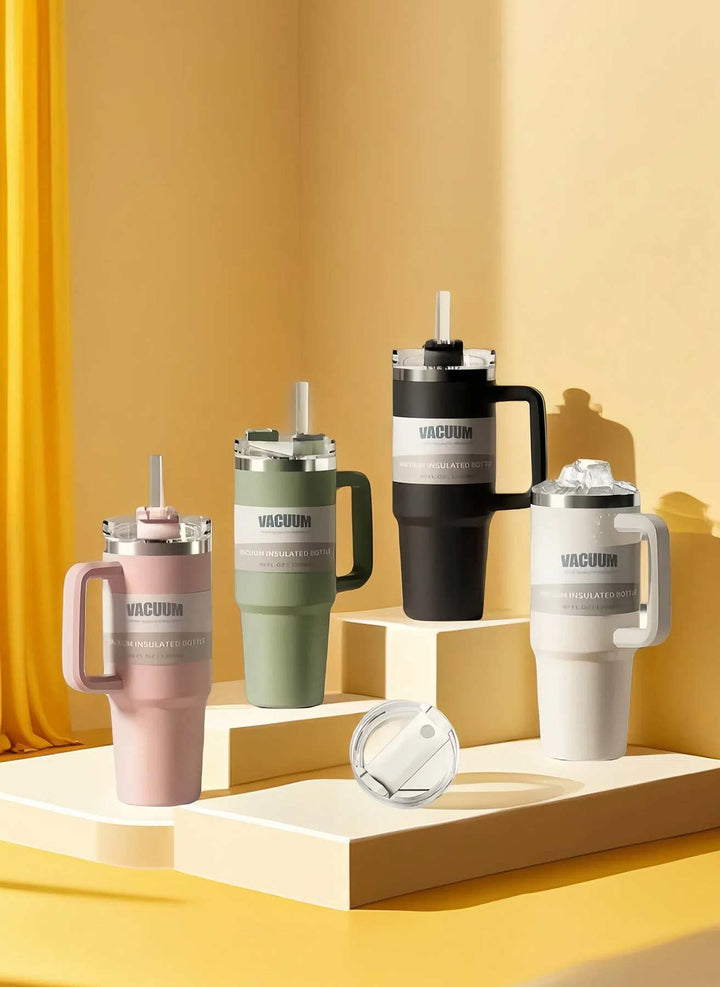 MyLaEvo bottles in pink, green, white, and black in yellow minimalist space
