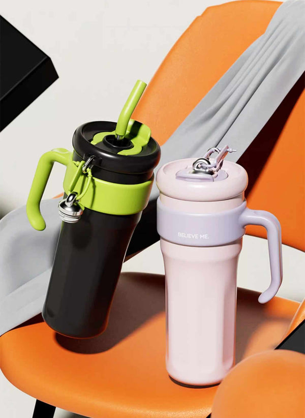MyLaEvo black-green and pink-purple bottles in orange backdrop with vibrant contrast