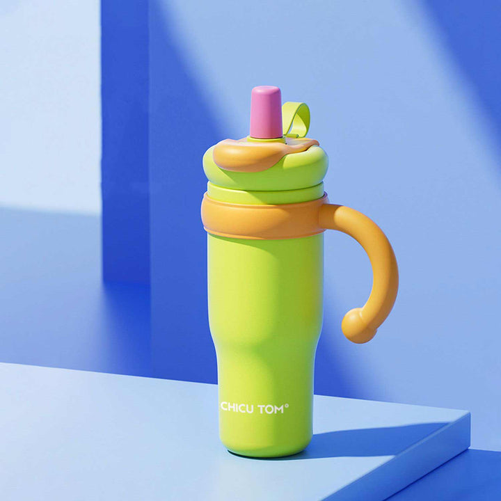 MyLaEvo mint green bottle with orange handle and pink cap against blue backdrop
