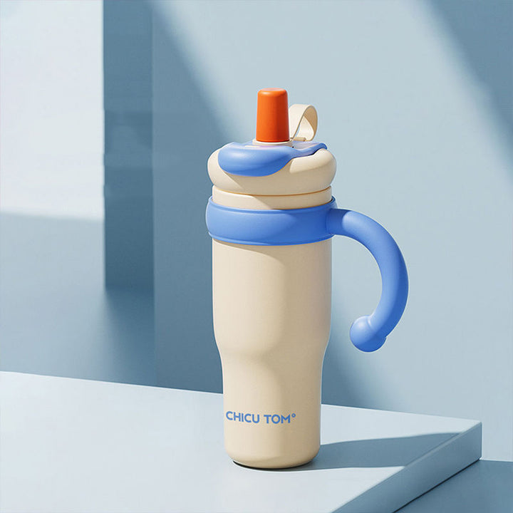 MyLaEvo ivory bottle with blue handle and orange cap on solid blue background