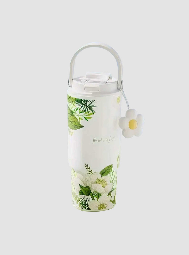 Mountain Flower tumbler in soft green setting with floral styling – MyLaEvo.