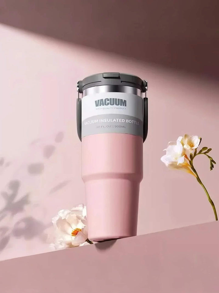 MyLaEvo pink bottle in pink floral minimalist scene, low angle