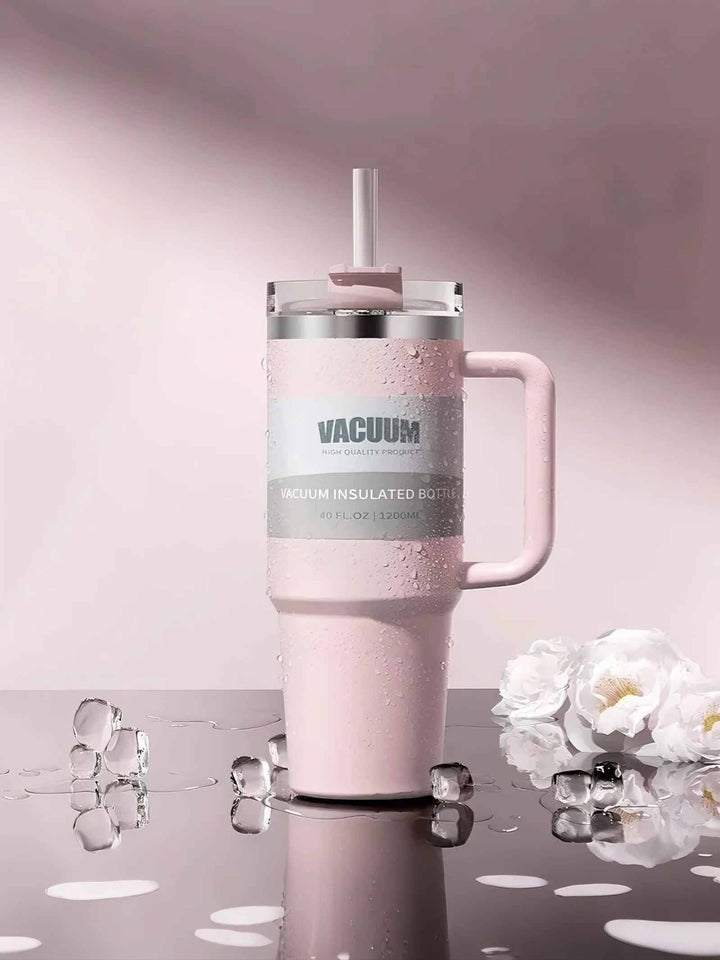MyLaEvo pink bottle with condensation and ice cubes in floral pink scene