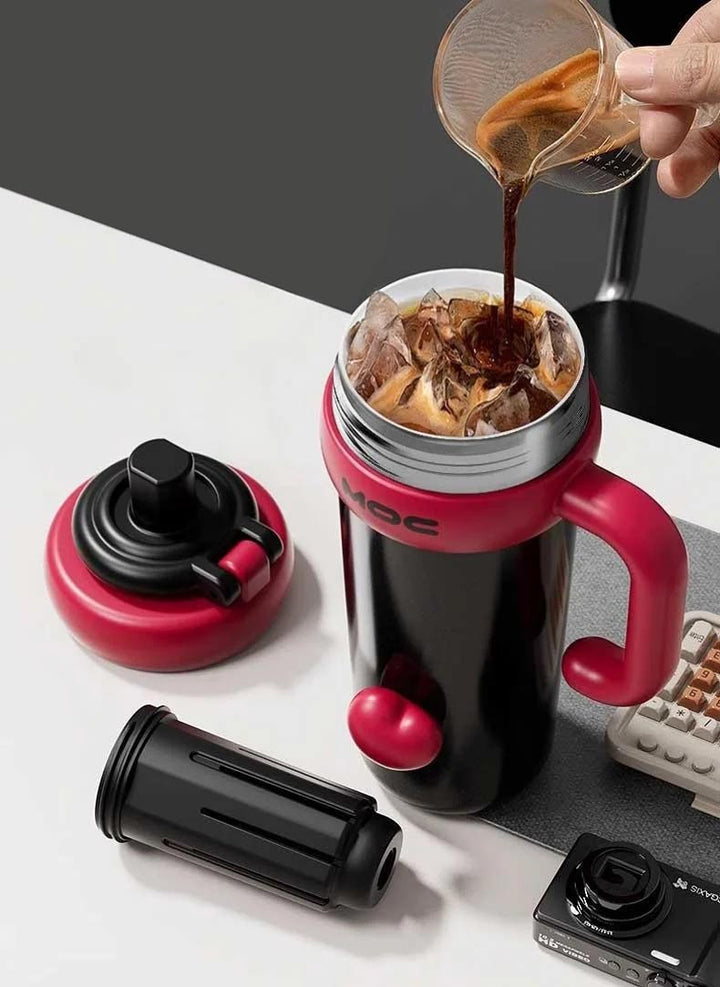MyLaEvo black bottle pouring coffee with separate tea infuser beside, showing multi-use