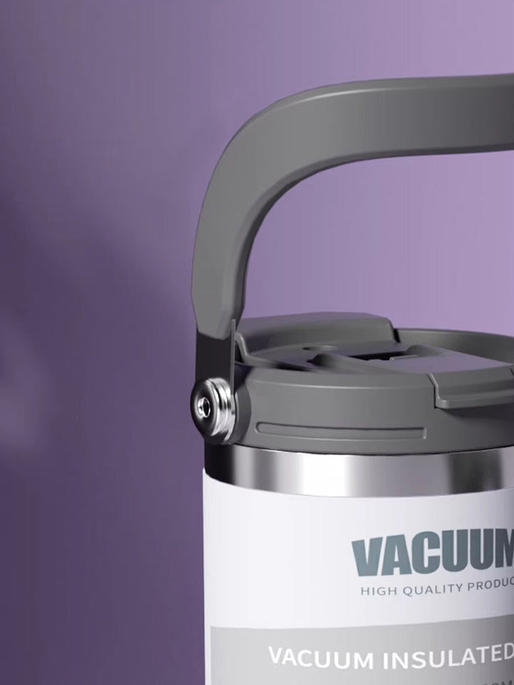 Close-up of MyLaEvo purple tumbler handle against purple background