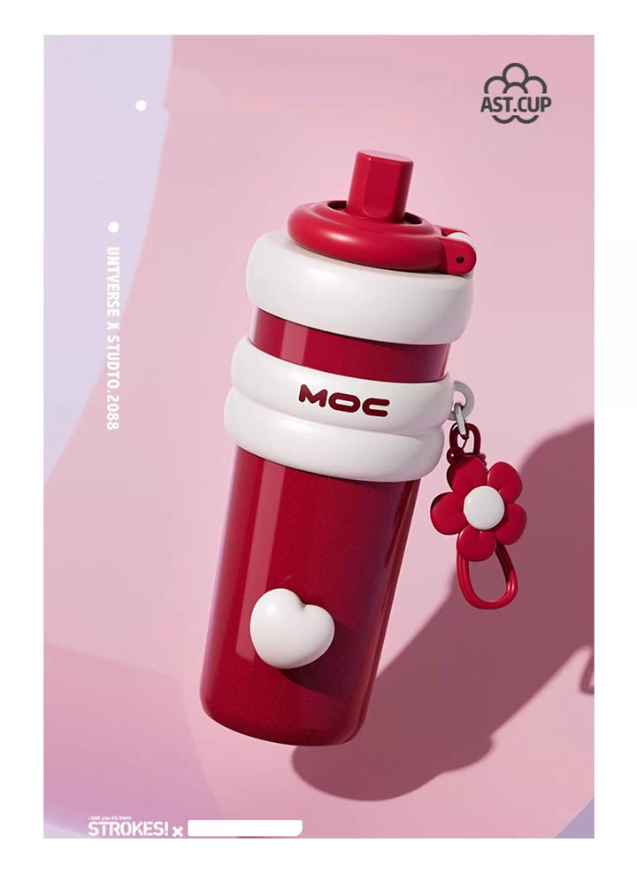 MyLaEvo red bottle with cream accents and heart floral pattern on pale pink backdrop