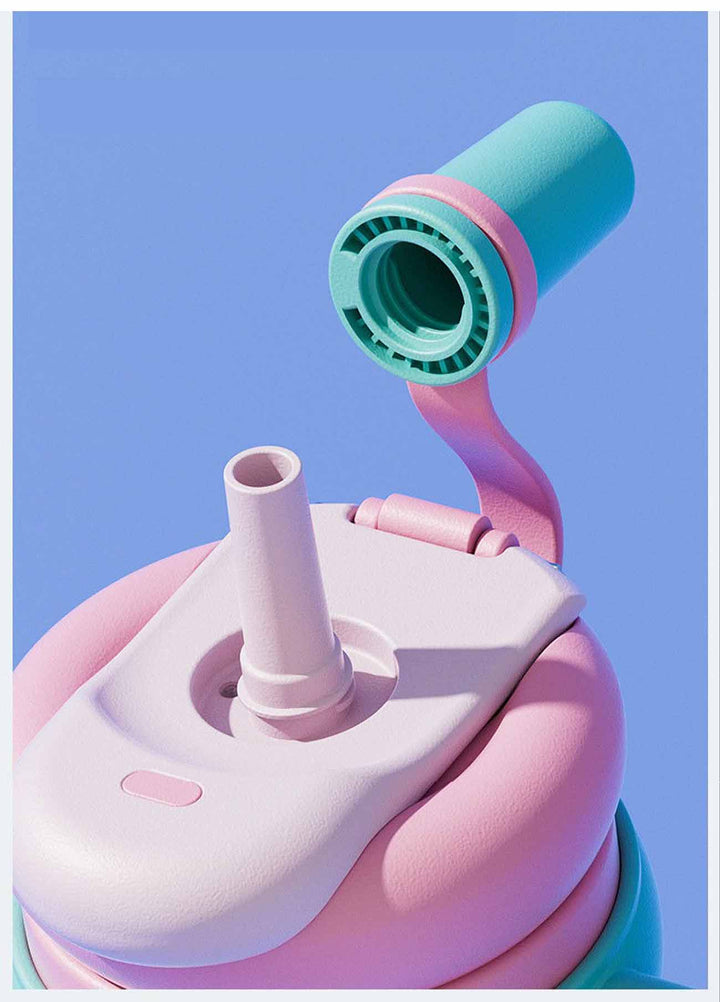 Close-up of MyLaEvo pink bottle with green cap showing straw lid on soft blue background