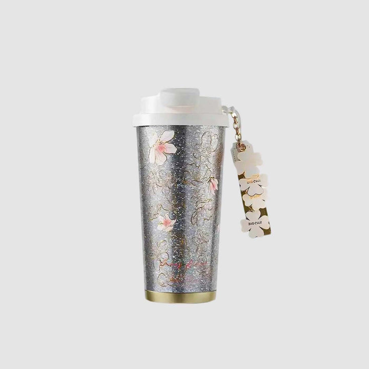 MyLaEvo natural titanium insulated cup with purple print design, displayed on clean white background