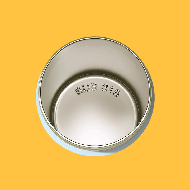 Top view close-up of product interior details on vibrant yellow background, showcasing design quality.