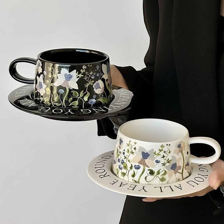 White and black ceramic cups on elegant desk, luxury coffee setup for stylish table display