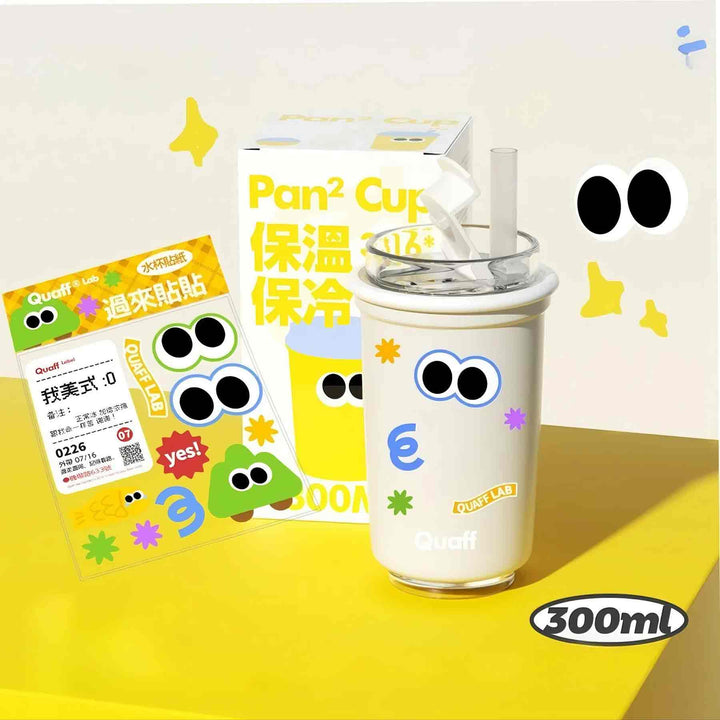 White cup with custom sticker, cute-style packaging, yellow-white contrast background for playful design.


