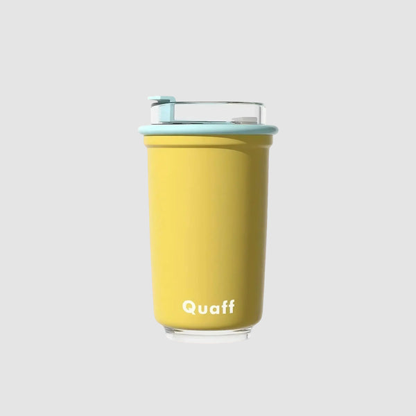 Yellow creamy cup with blue rimmed lid, showcasing a soft cream style and delicate color contrast for a cute, stylish look.