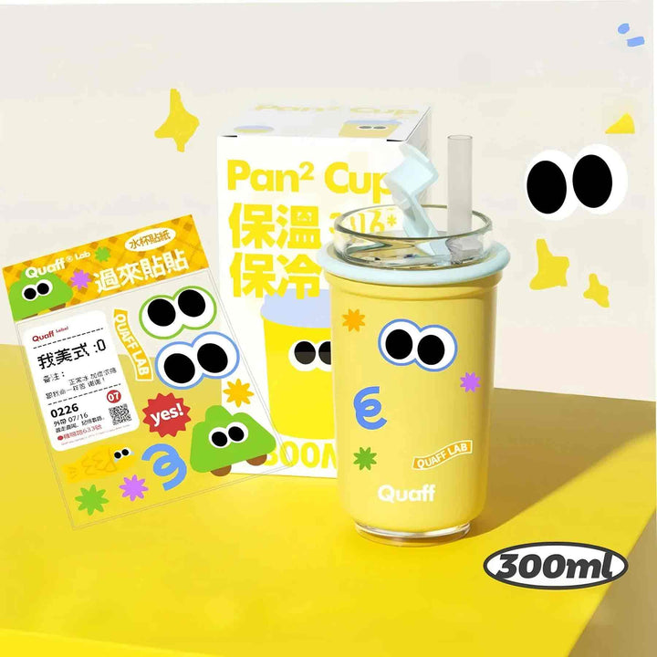 Yellow cup with custom sticker, cute-style packaging, yellow-white contrast background for lively display.